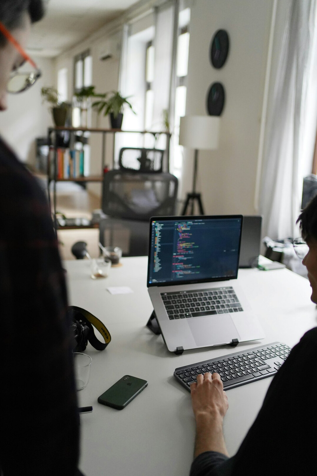 woman coding at desk